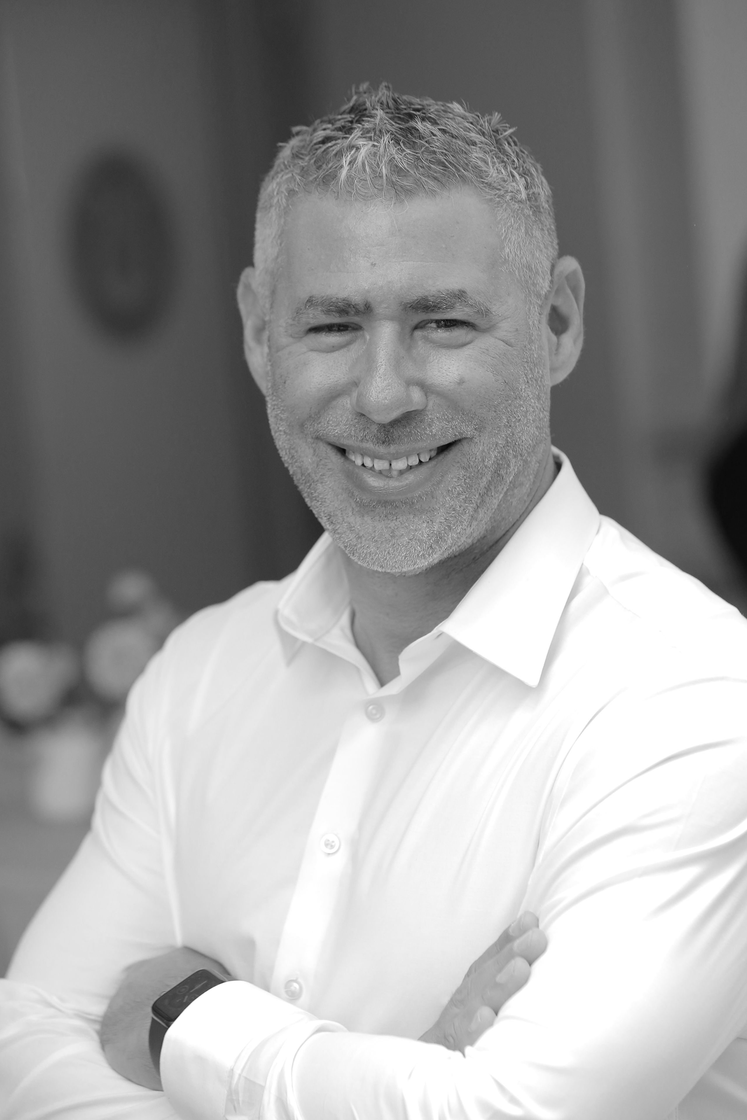 Professional black-and-white headshot of Brian Franklin, founder of Vows & Speeches, expert wedding speechwriter and vow coach based in California