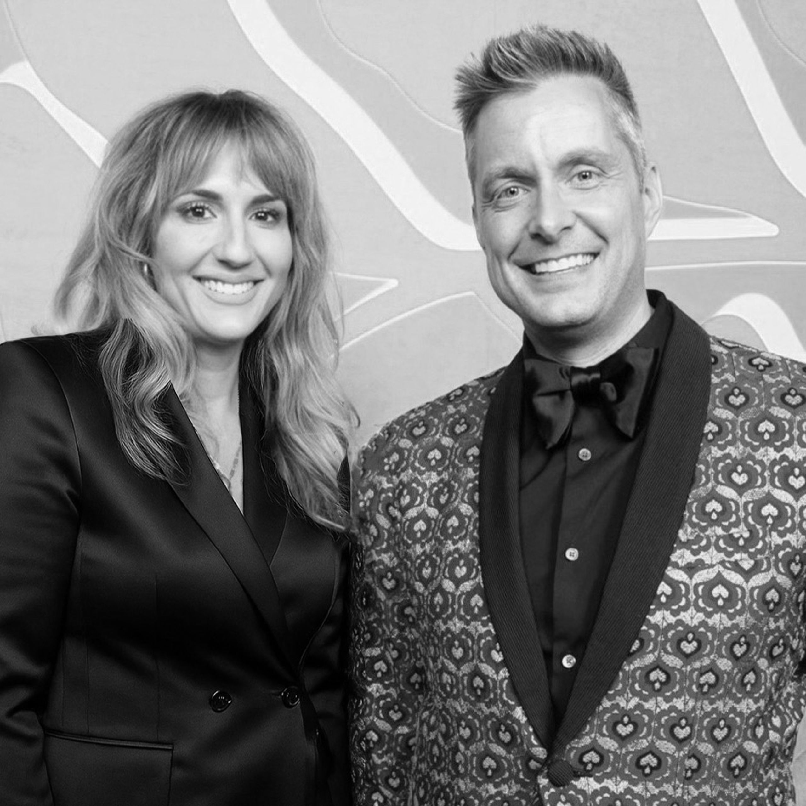 Kristeen Widmyer and Brian Larson of Strictly Personal Designs pose together, showcasing their creative partnership as co-owners of the Los Angeles-based custom wedding paper goods and design studio.
